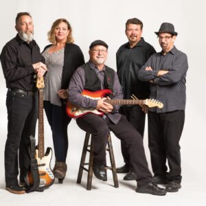 Live music by the Never Never Band at The Town Square at Circle Square Commons